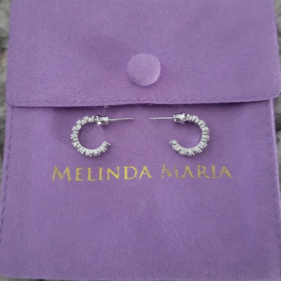 Melinda Maria "Baby Shes An Icon" Silver Huggie Hoop Earrings - Picture 2 of 3